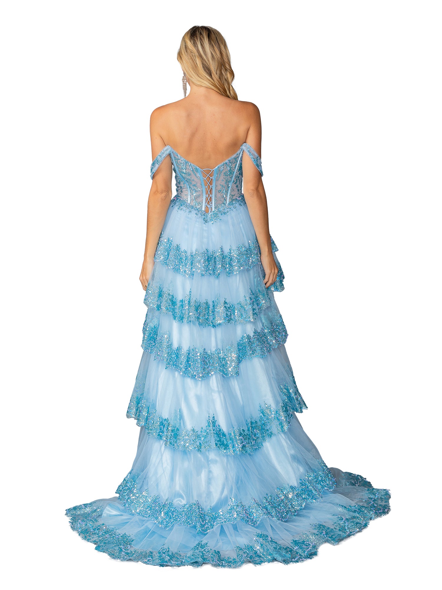 A woman faces away in the Long Sequin-Ruffle Prom Dress: Dancing Queen 4440, an off-the-shoulder light blue gown with ruffles, lace, sequin accents, a sheer back detail, and a long train—perfect for prom or formal occasions.